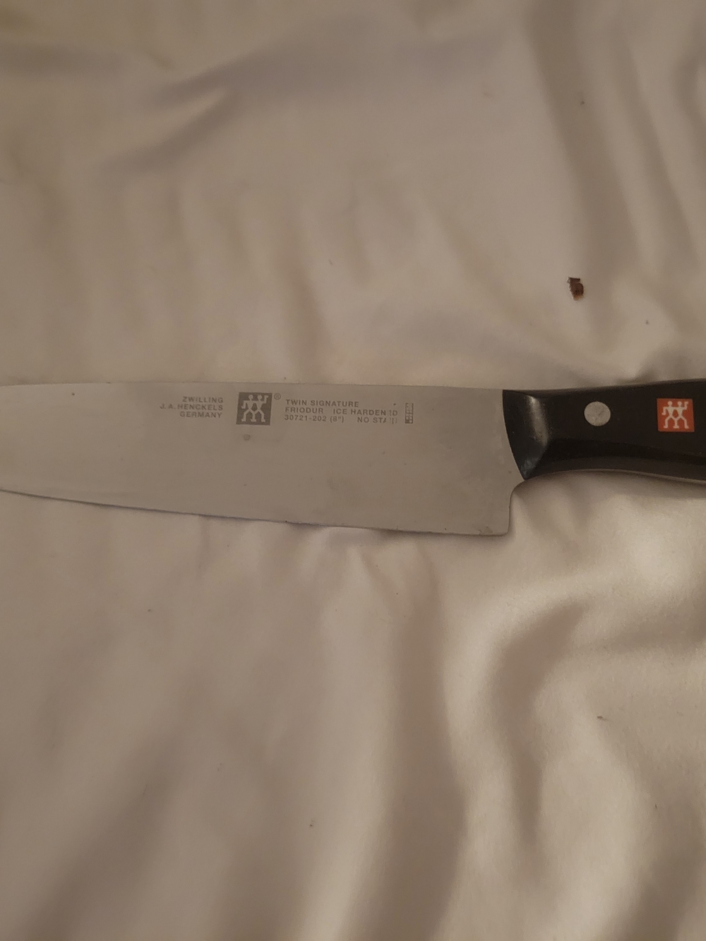 ZWILLING J.A. Henckels Silver Blade Chef Knife with Black Handle